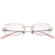 Elegant Diamond-Cut Rimless Optical Glasses with Pink Temples