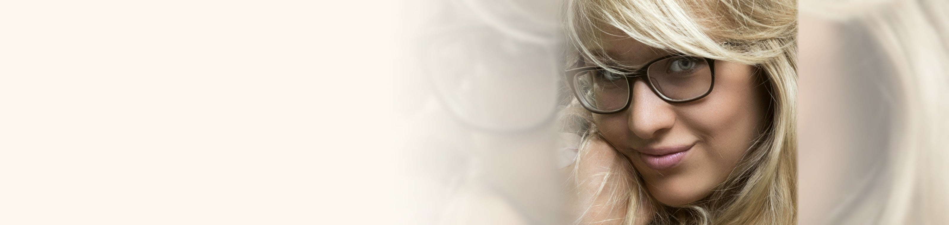 Woman wearing delicate gold eyeglasses
